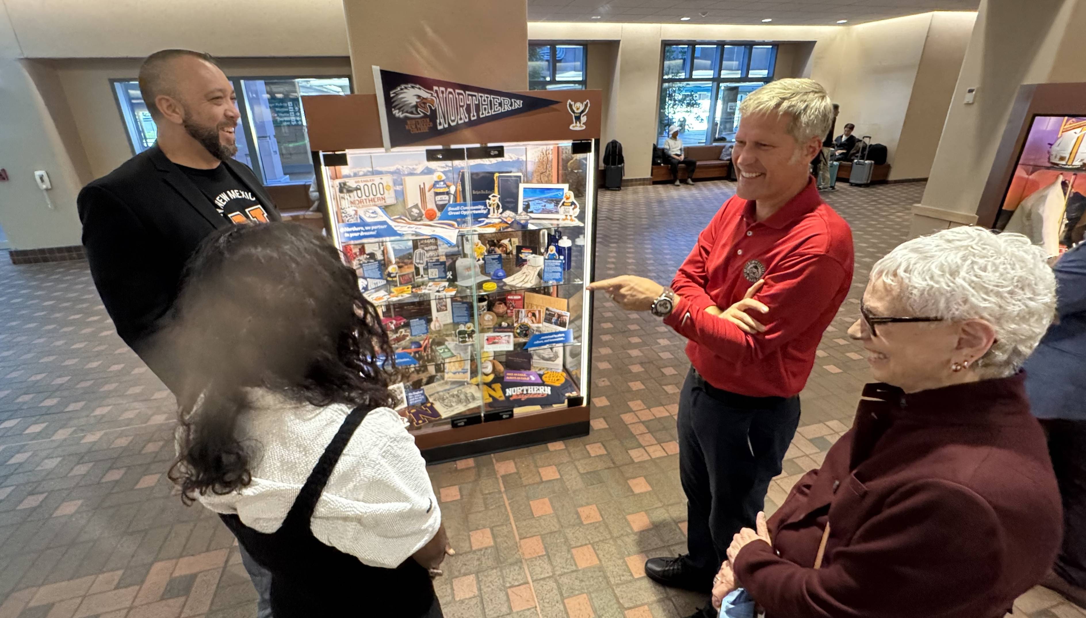 Scott Stokes, Sandy Krolick and Milam Shah having a conversation with Mayor Tim Keller at the Sunport Scott Stokes, Sandy Krolick and Milam Shah having a conversation with Mayor Tim Keller at the Sunport